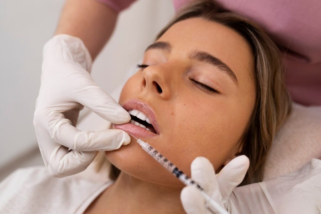 close-up-woman-getting-lip-filler_23-2149313536